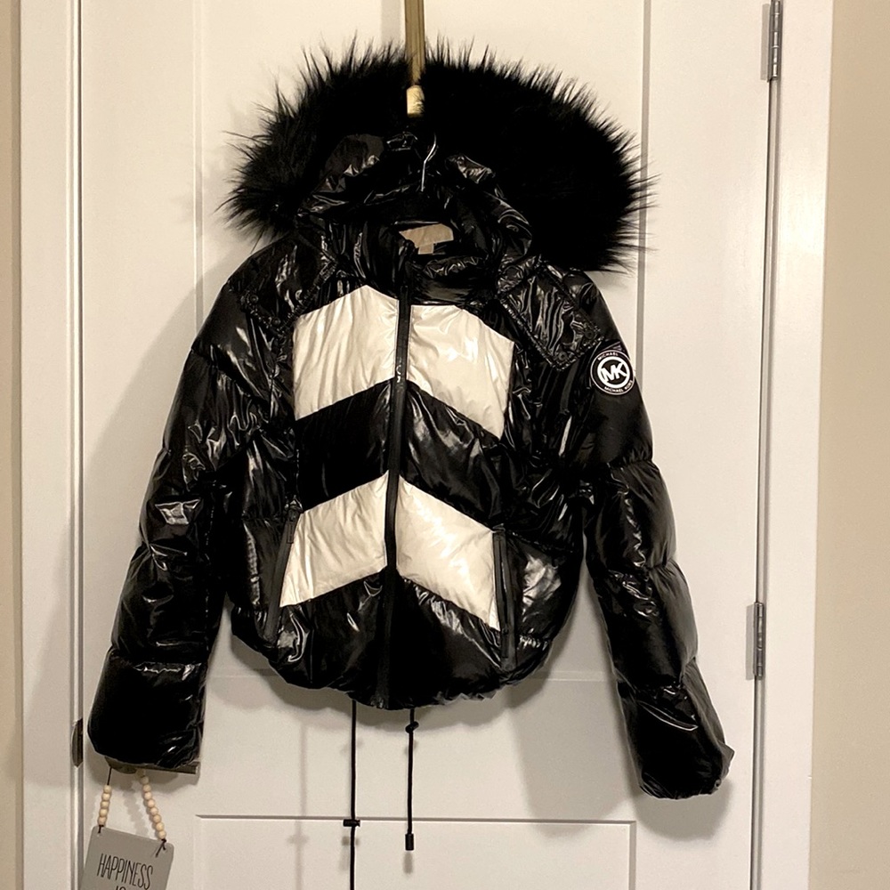 Lightweight black and white Michael Kors Ski’s jacket lightly used.